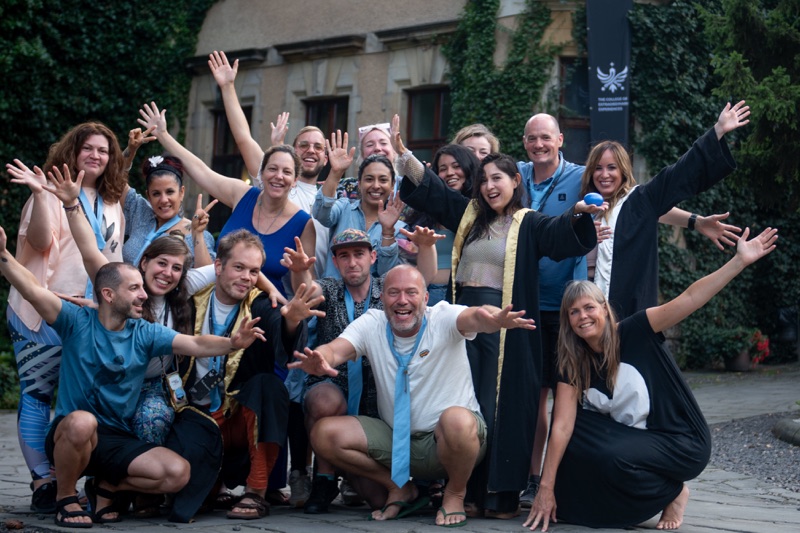 A group of participants posing together outside