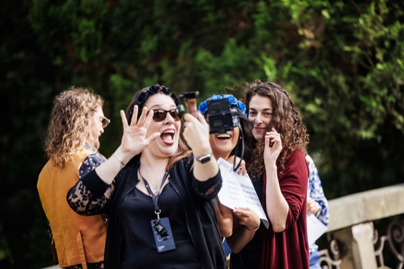 Participants looking through their hands like binoculars